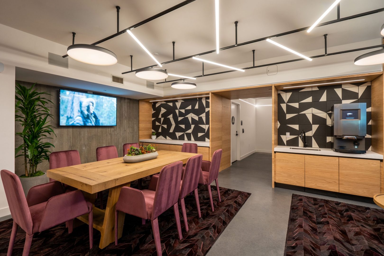 Prism Apartments lounge seating with coffee machine